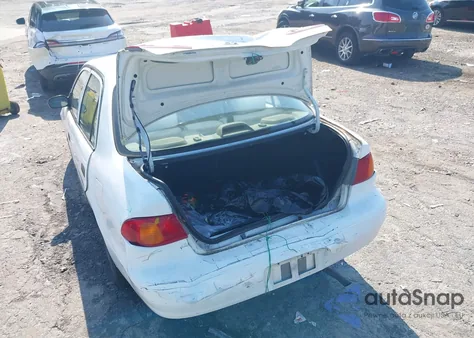 2000 Toyota Corolla Ce z USA, uszkodzony, nr VIN 2T1BR12E6YC342194